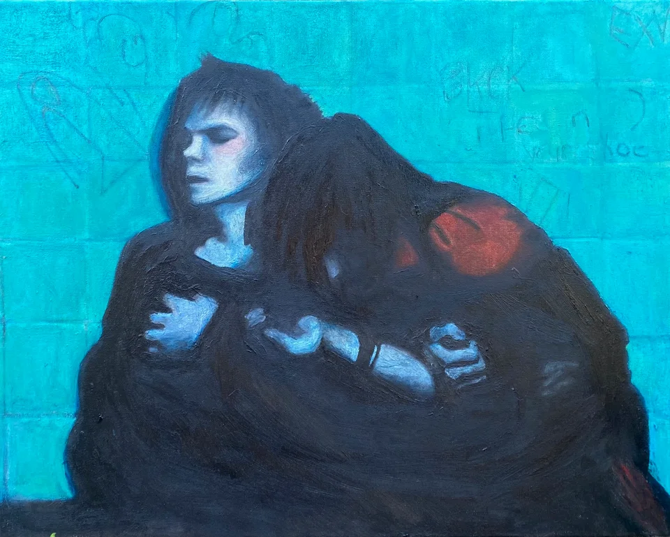 Two figures together against a vivid blue background