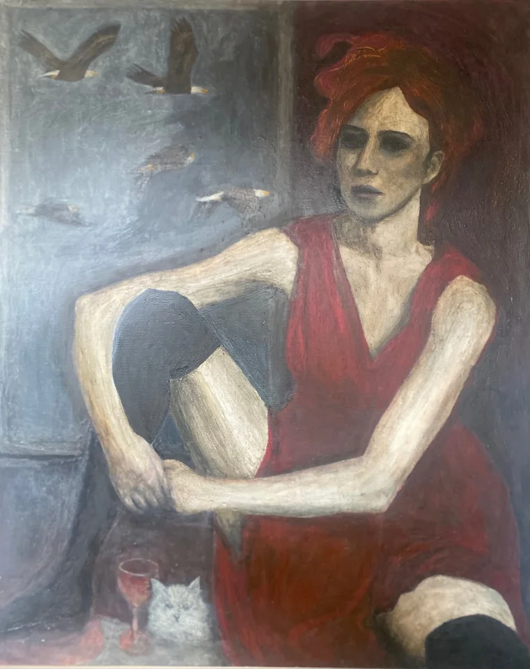Portrait of a seated woman in a red dress