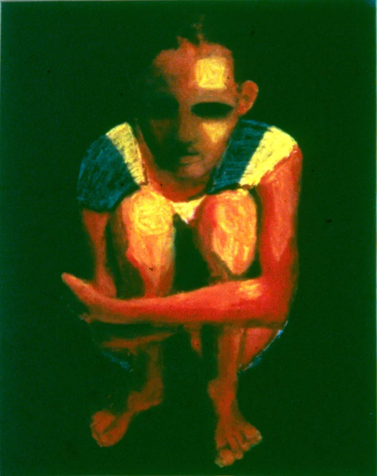 A seated figure lit in orange against a green background