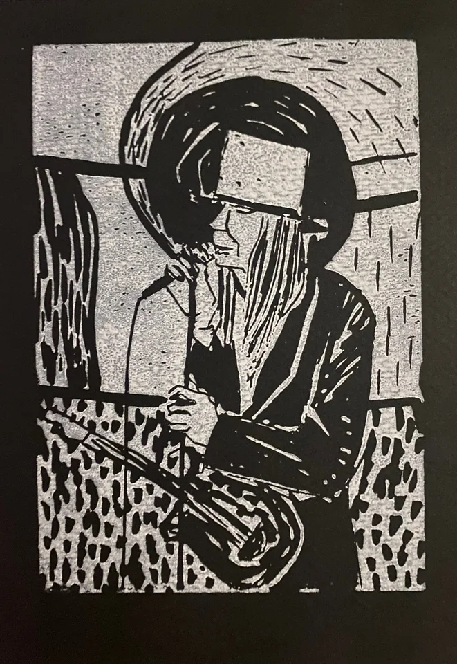 A black and cream patterned portrait print